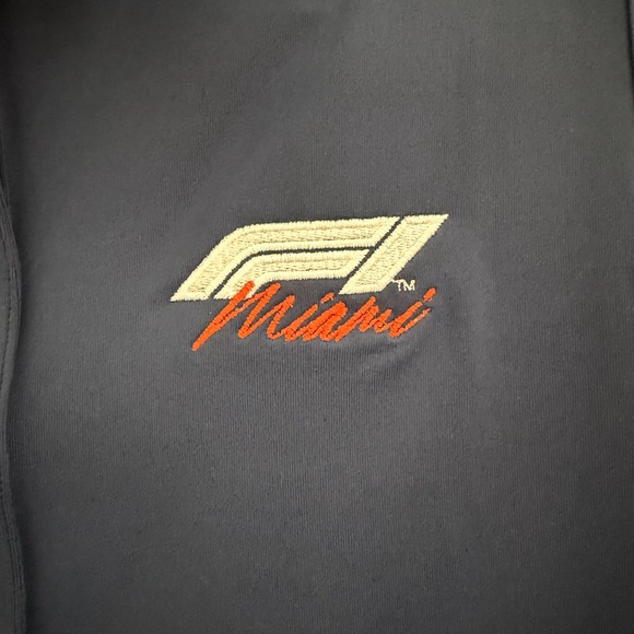 Peter Millar F1 Miami Navy Sleeveless Polo Tee - Picture 2 of 4